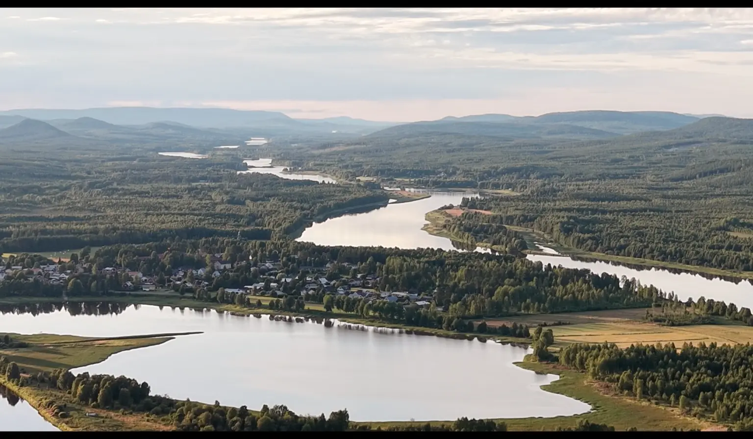 River flowing through the forests of northern Sweden